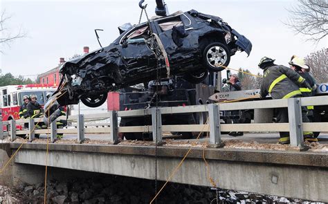 car crash off bridge
